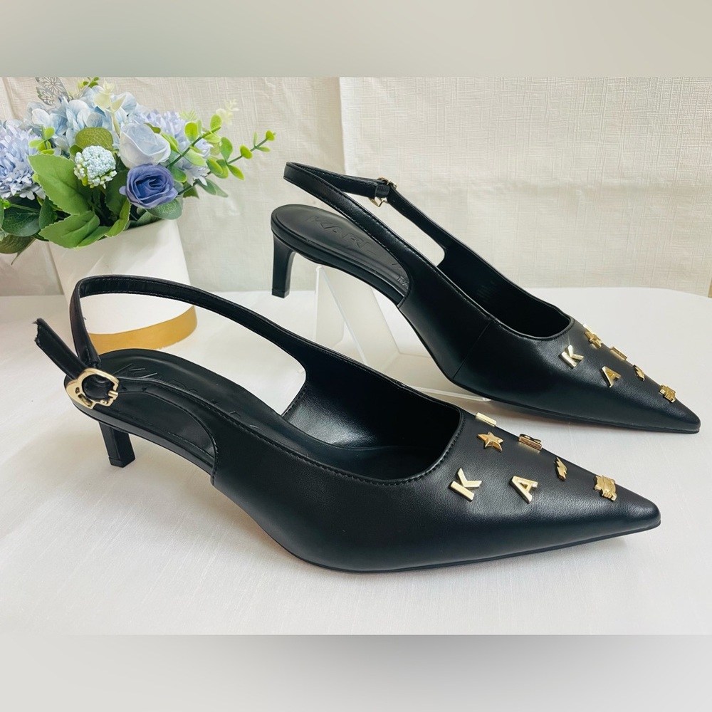 Karl Lagerfeld Paris Heels Black logo charms                      Size US 9 M